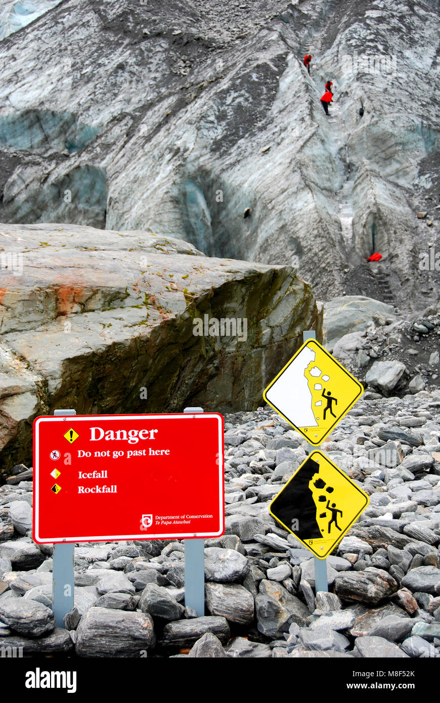 Warning Signs on Franz Josef Glacier, Mt Cook National Park, South Island New Zealand Stock Photo