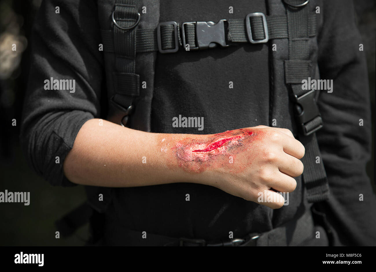 make up scar process on stuntman hand in war cinema industry Stock Photo