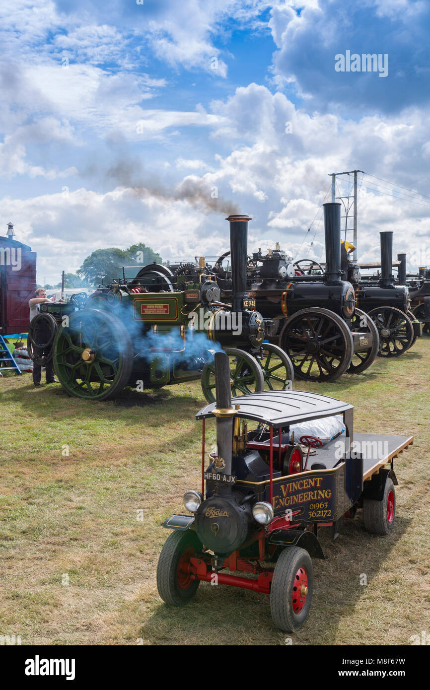 A display of different sizes of traction engines and a miniature steam lorry at the 2017 Norton Fitzwarren Steam Rally, Somerset, England, UK Stock Photo
