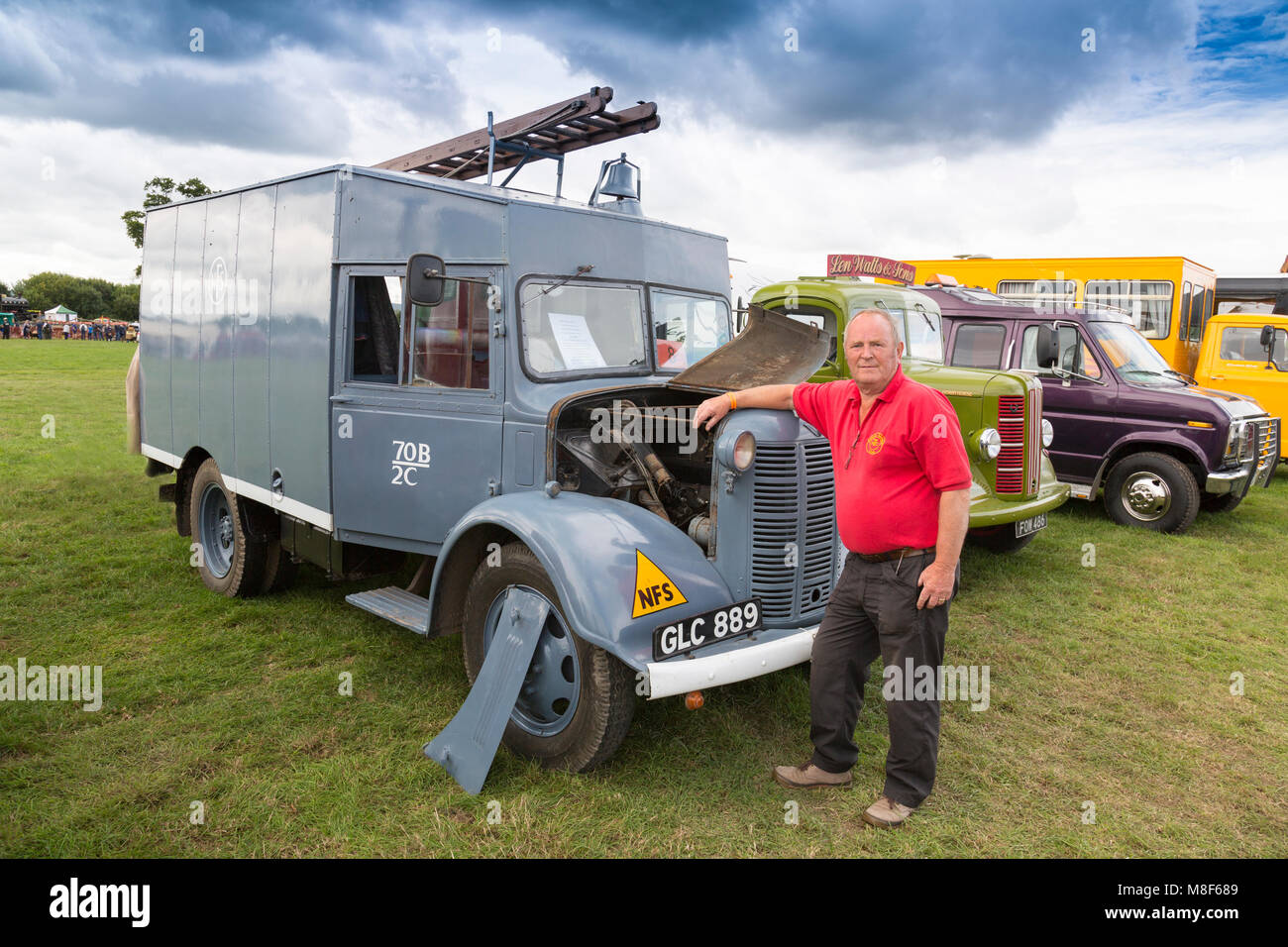 A restored 1941 Austin K2 Fire Engine and its owner at the 2017 Norton