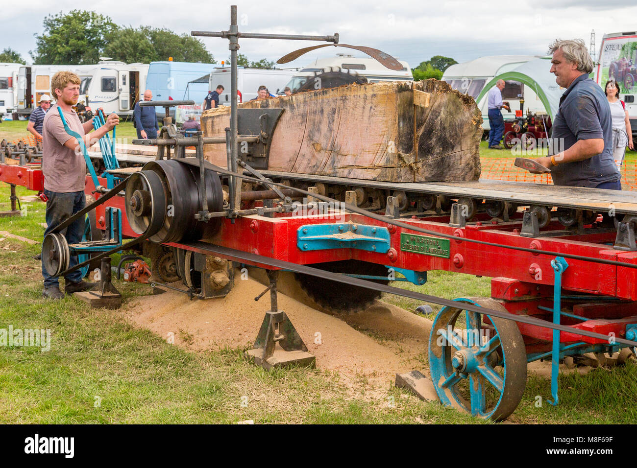 A Demonstration Of A Saw Bench Driven By A Traction Engine At The
