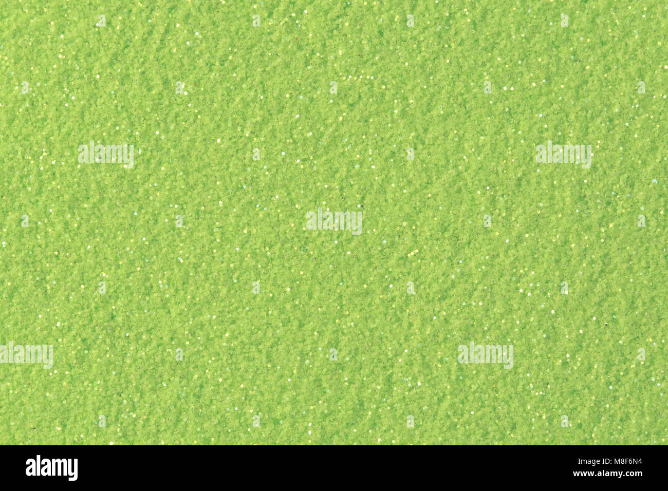 Lime glitter background.  Low contrast photo. Stock Photo