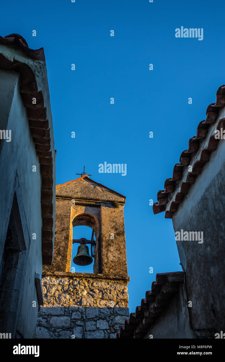 The tower bell church in a blue sky background Stock Photo - Alamy