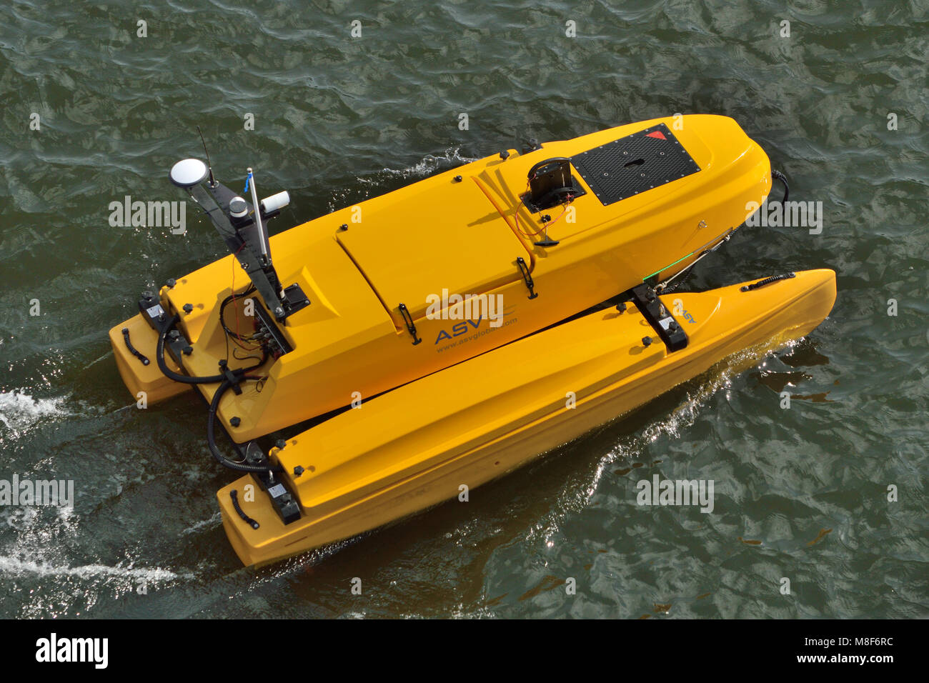 ASV Global C-CAT3 unmanned autonomous surface vessel being demonstrated at the Oceanology International 2018 exhibition in London's Royal Docks Stock Photo