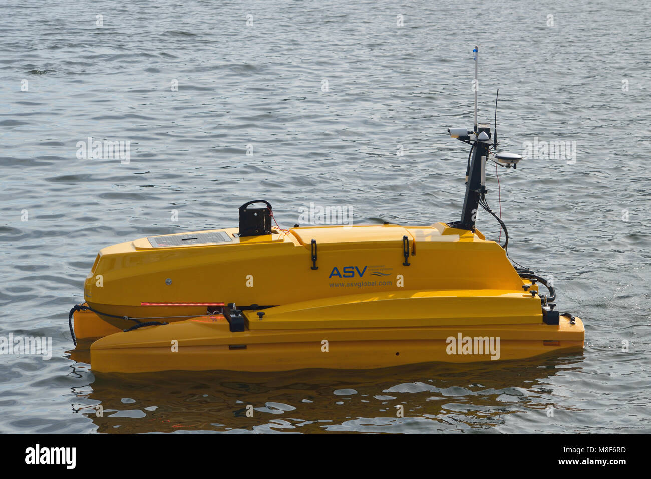 ASV Global C-CAT3 unmanned autonomous surface vessel being demonstrated at the Oceanology International 2018 exhibition in London's Royal Docks Stock Photo