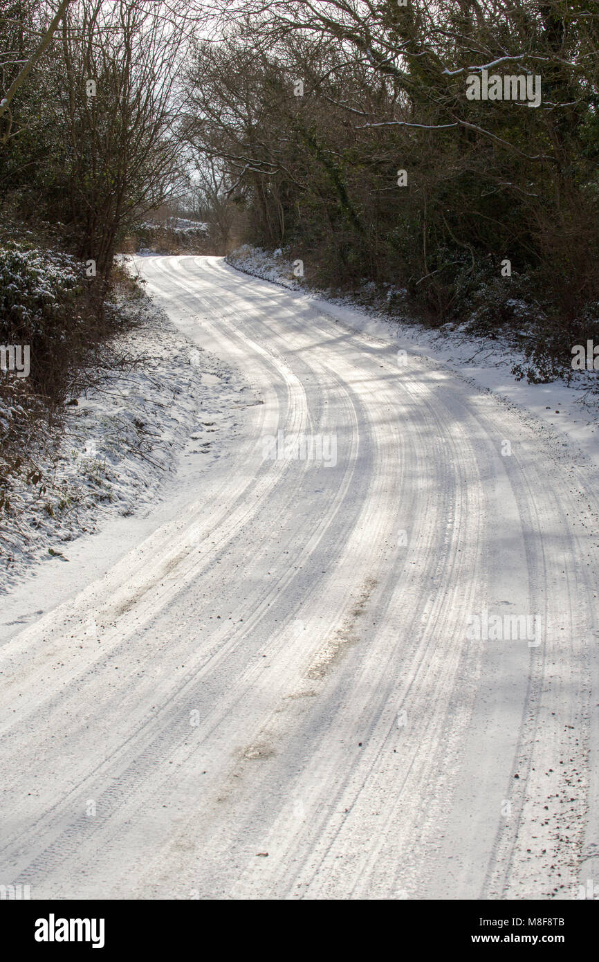Icy road during the beast from the east freezing weather, warton crag, lancashire UK Stock Photo