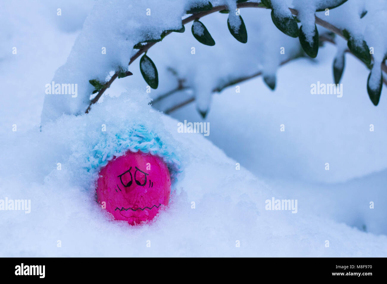 easter egg in snow Stock Photo