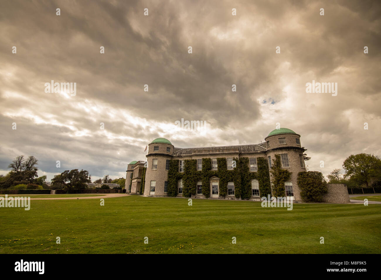 Goodwood House on the Goodwood Estate on a Spring day near Chichester, West Sussex, UK Stock Photo