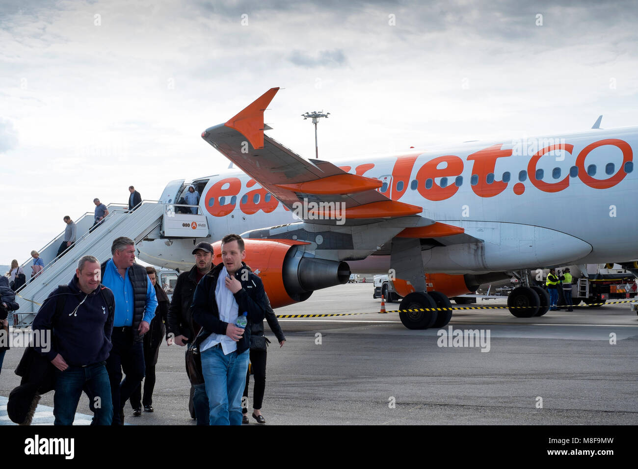 Passengers disembark from an Easyjet Airbus A319 at Marseille-Provence Airport in Marseille, France Stock Photo
