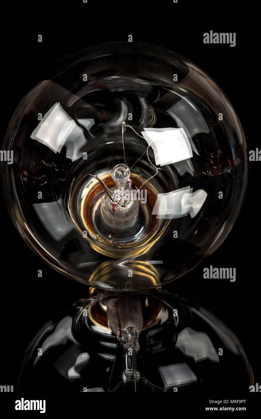 Glass light bulb with the tungsten element exposed Stock Photo Alamy