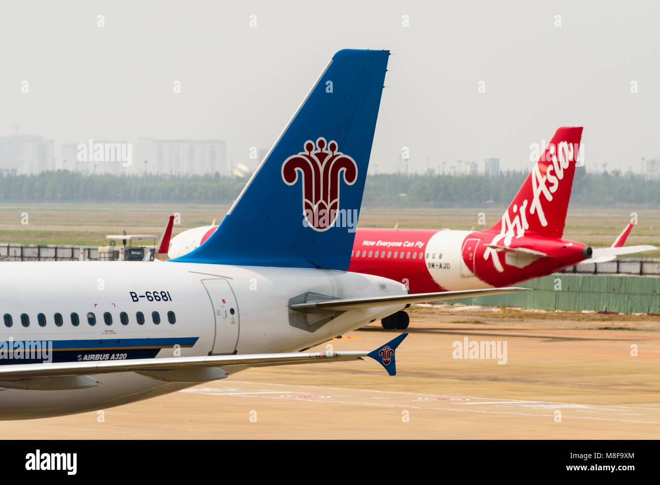 China Southern Airlines A320 and Air Asia A320, Ho Chi Minh International Airport, Ho Chi Minh City, Vietnam Stock Photo