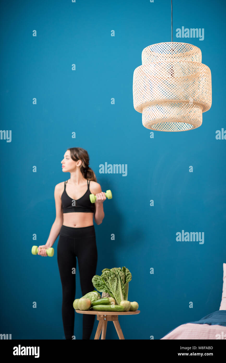 Healthy sports lifestyle with fresh green food concept Stock Photo