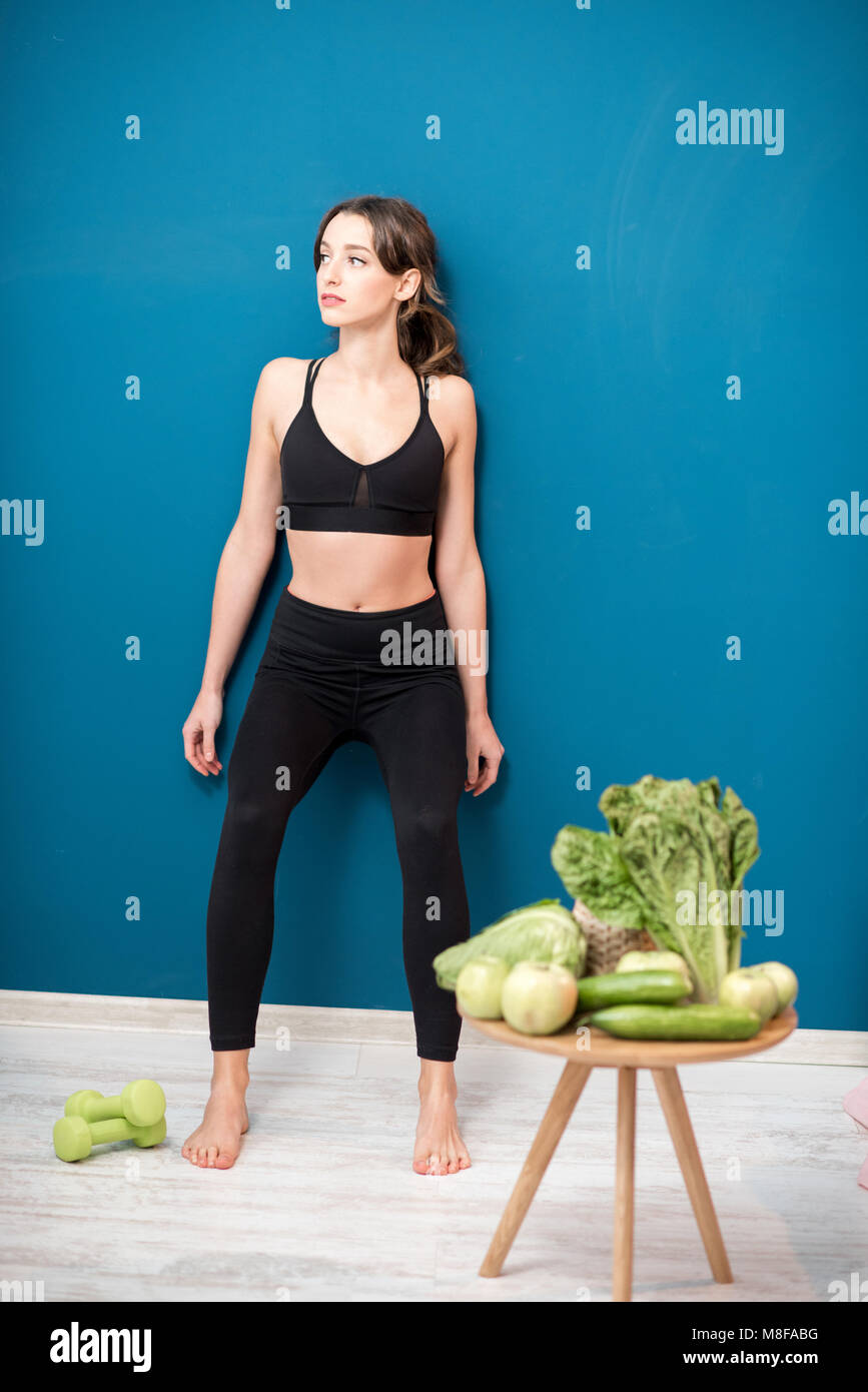 Healthy sports lifestyle with fresh green food concept Stock Photo