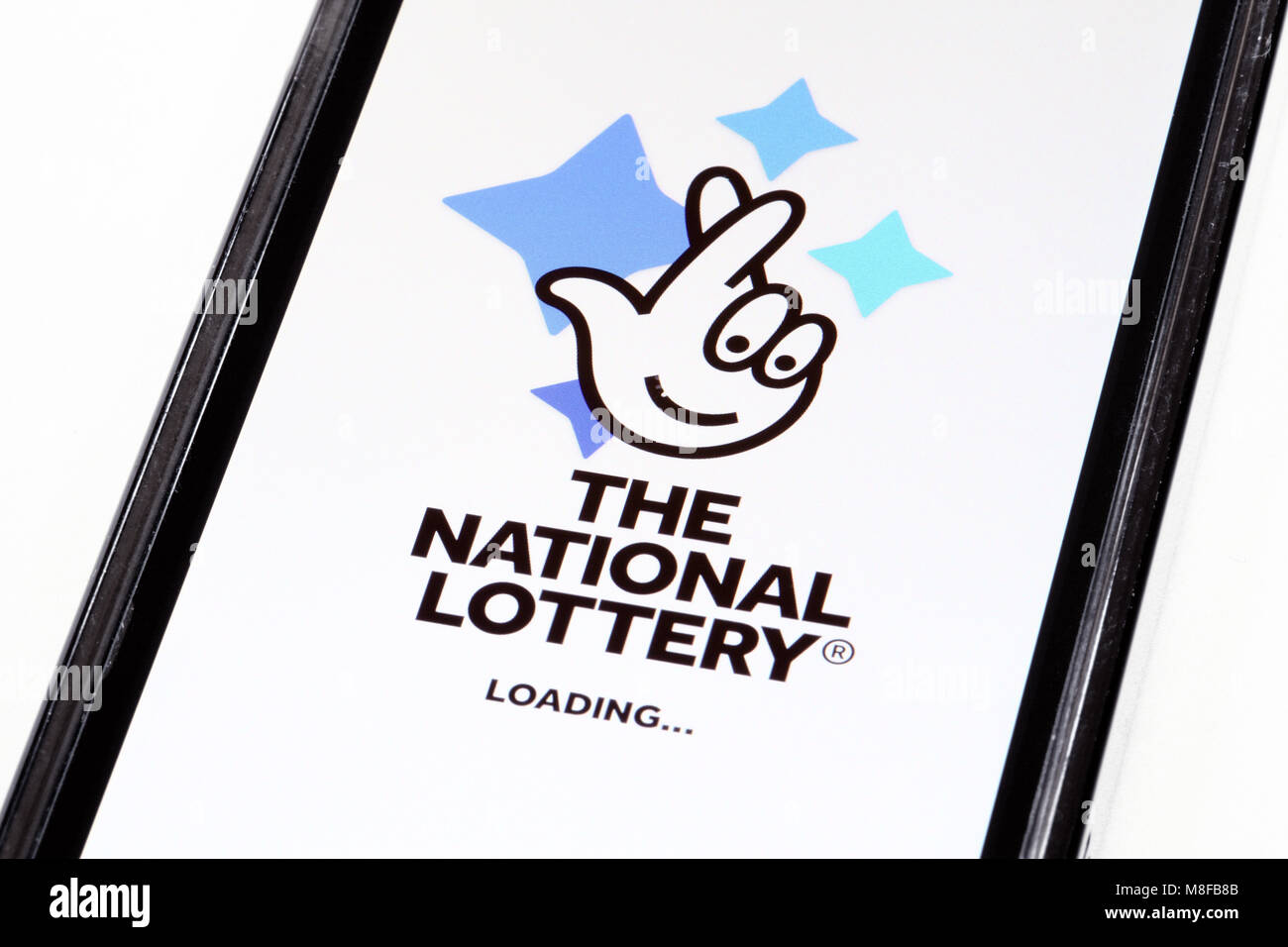 The National Lottery logo and mobile phone app / application. Stock Photo