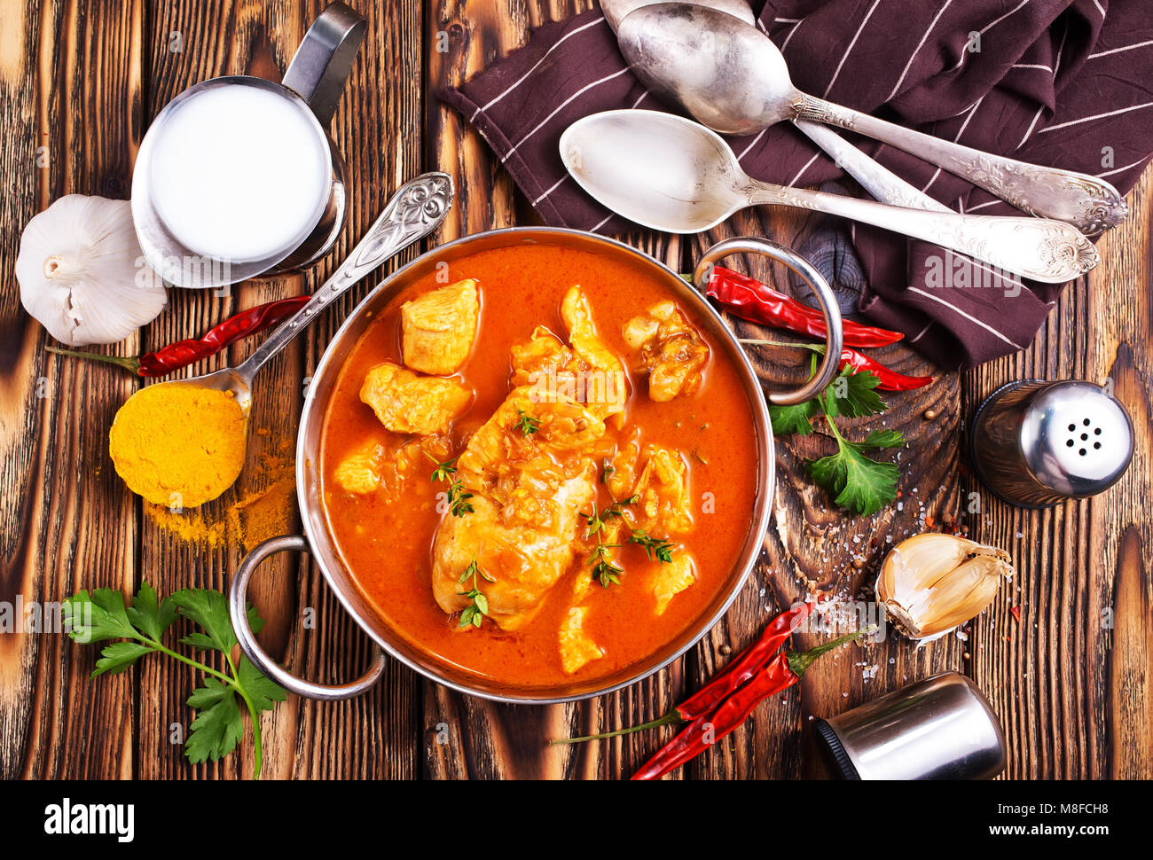 Traditional Indian dish chicken. Spicy chicken curry in bowl Stock