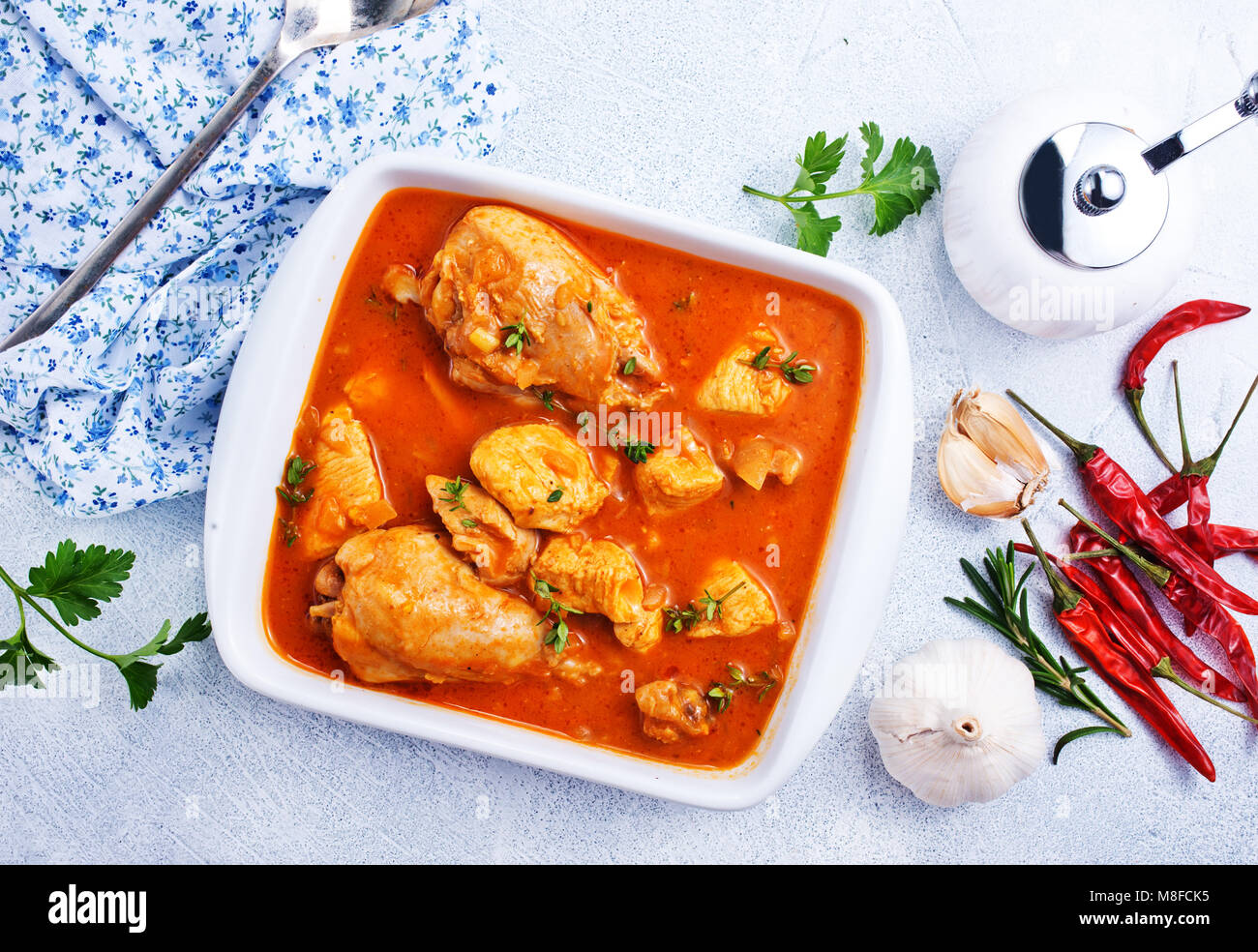 Traditional Indian dish chicken. Spicy chicken curry in bowl Stock