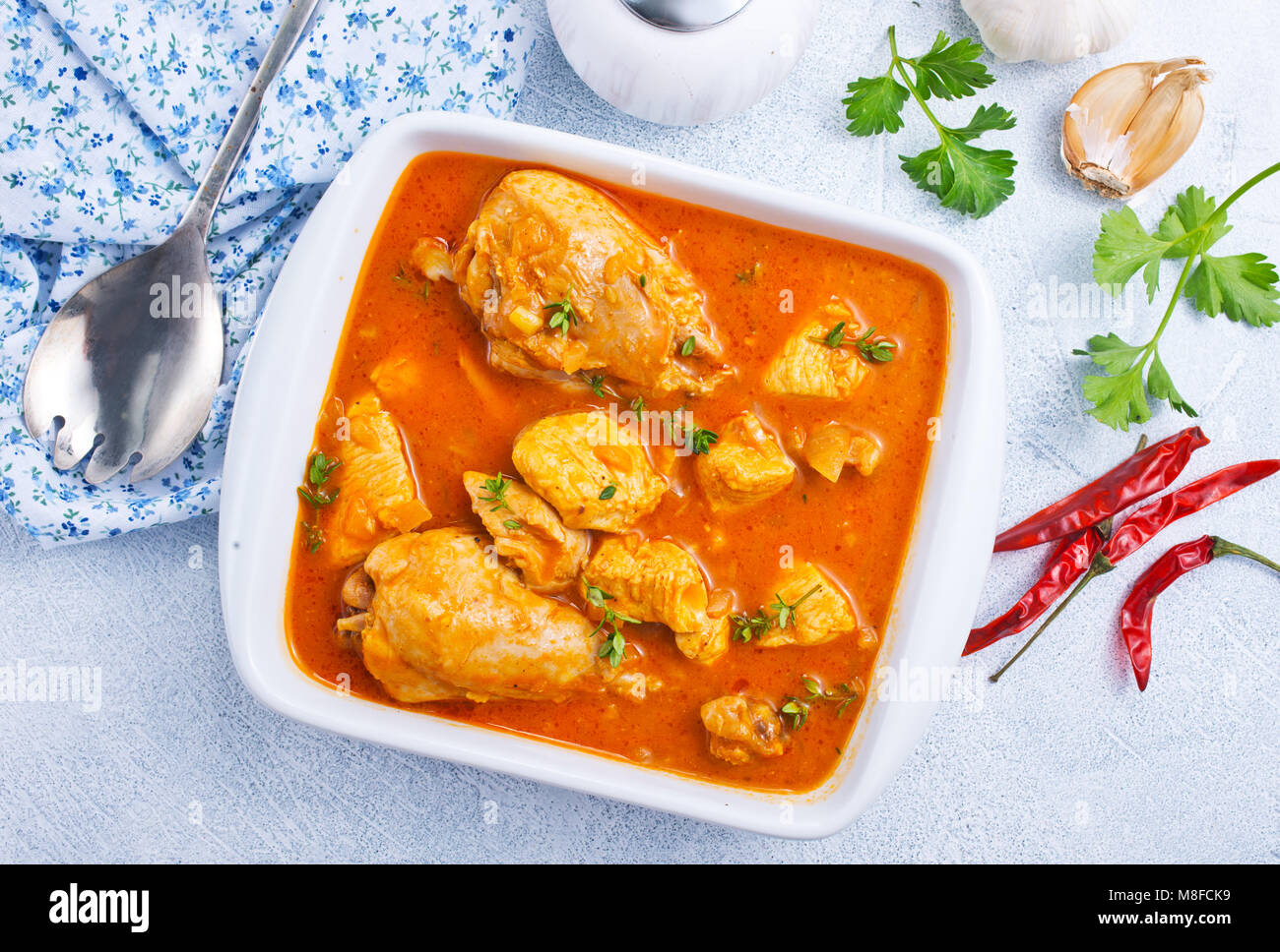 Traditional Indian dish chicken. Spicy chicken curry in bowl Stock