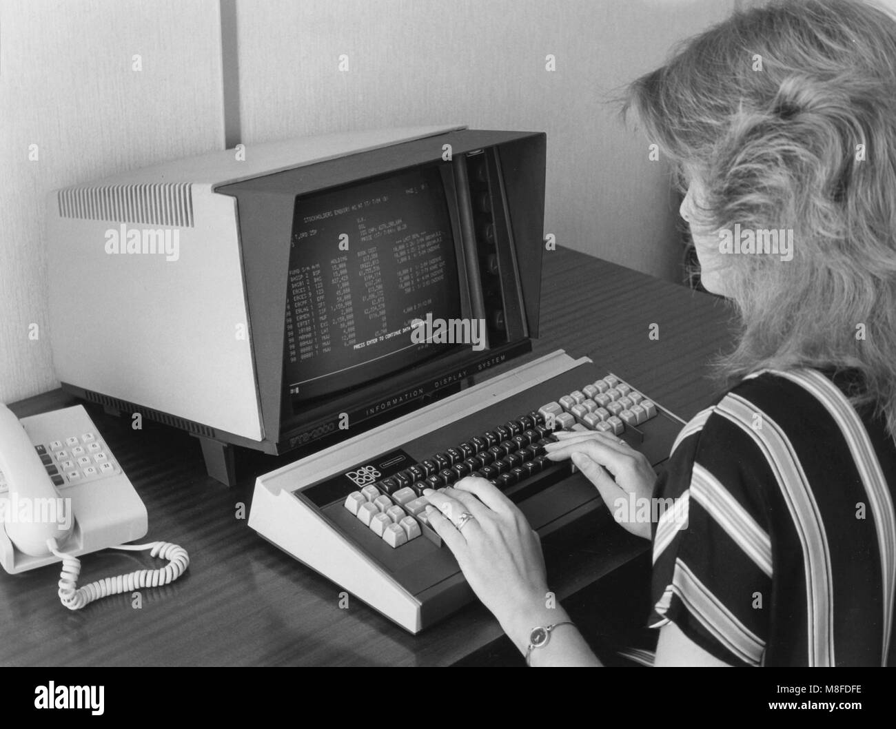 Vintage computers in use in offices Stock Photo