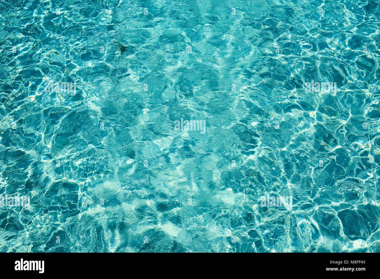 Nice blue water ripples in a sunny day Stock Photo - Alamy