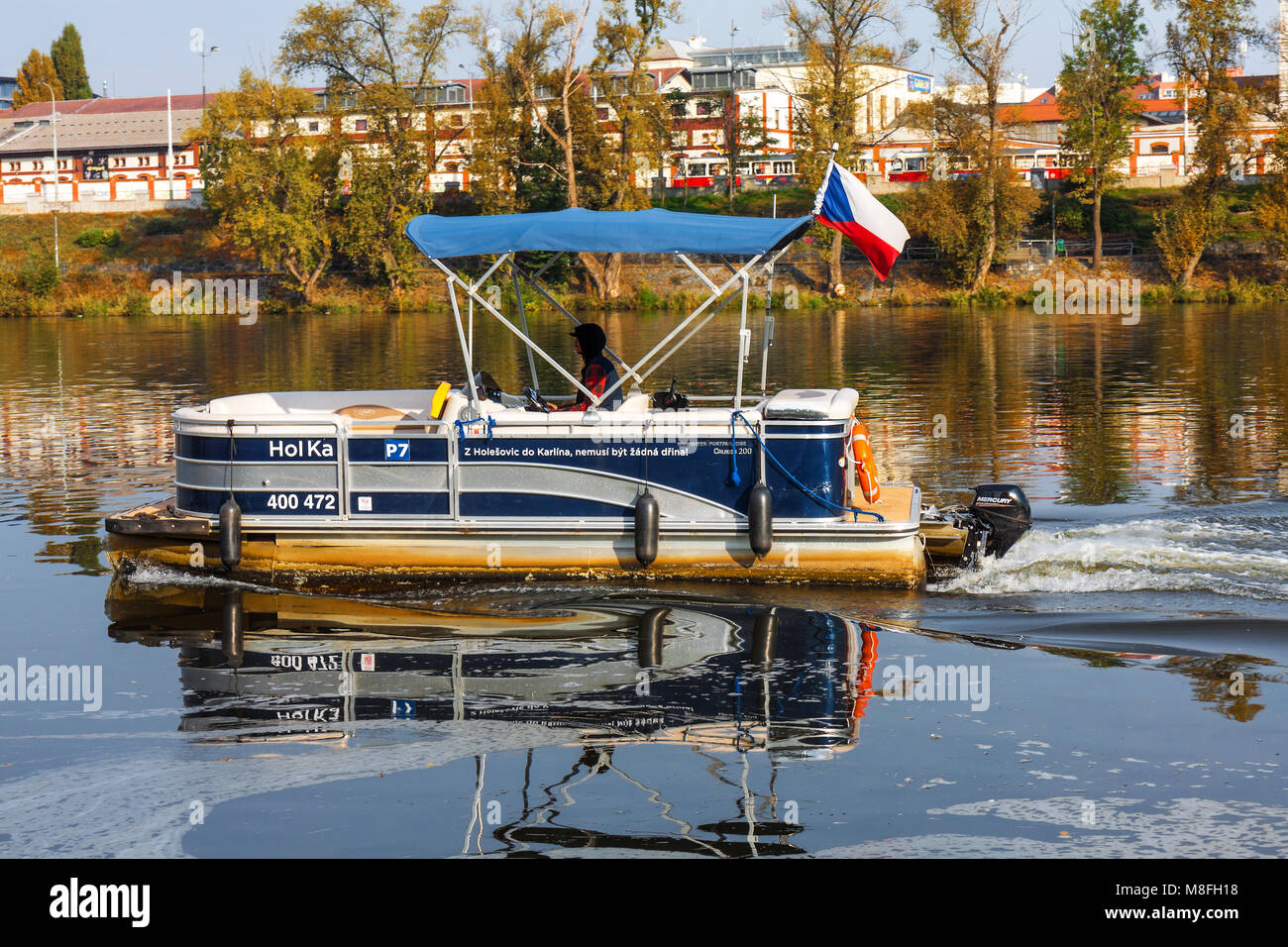 PRAGUE - October 1: Ferry Hol Ka transports passengers from district Karlin to district Holesovice on October 1, 2017 on Vltava river. Stock Photo