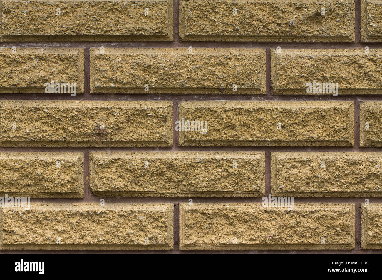Stone wall of the rectangular bricks - close up Stock Photo - Alamy