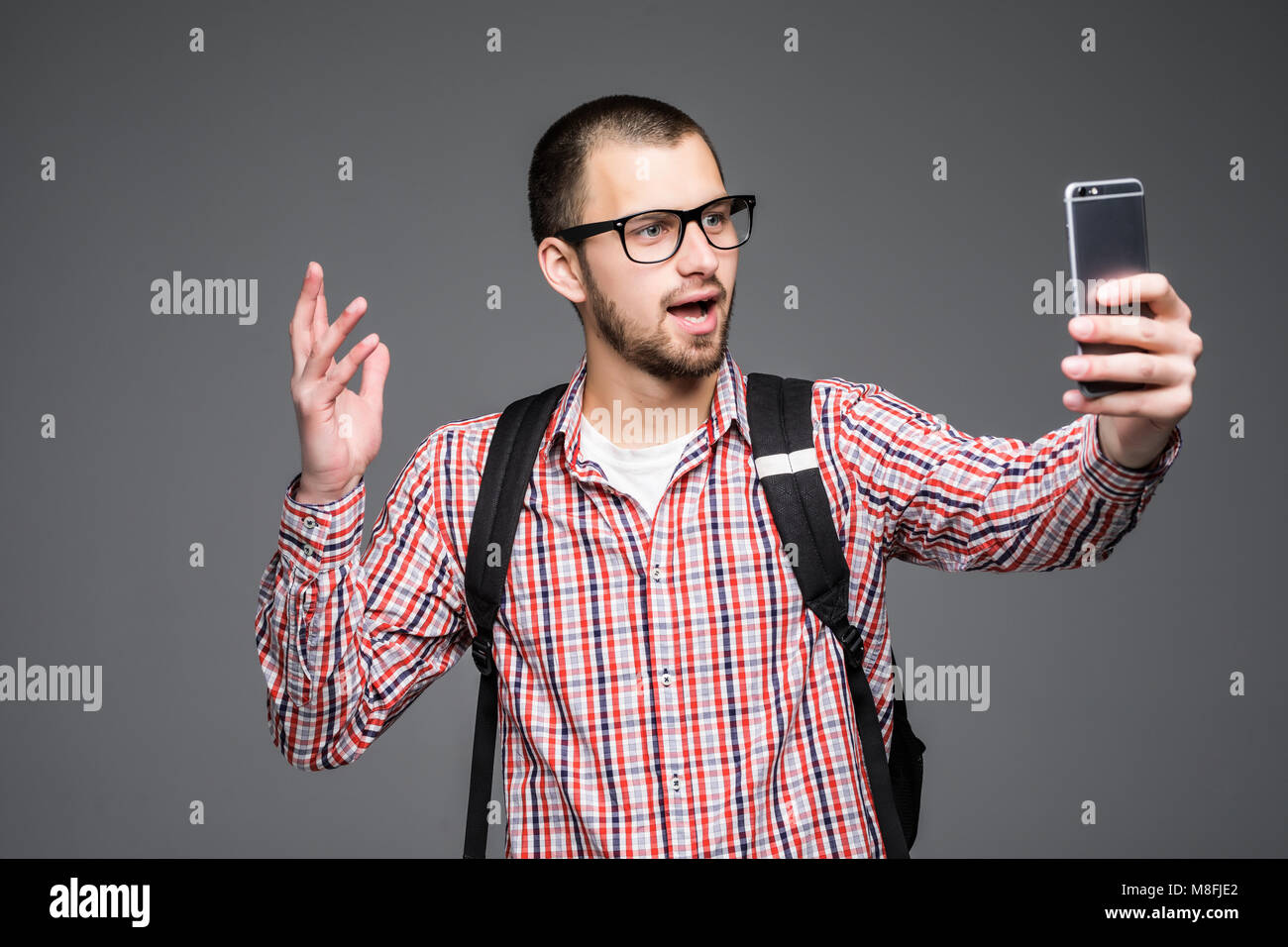 Happy Young Man Taking Self Portrait Photography Through Smart Phone