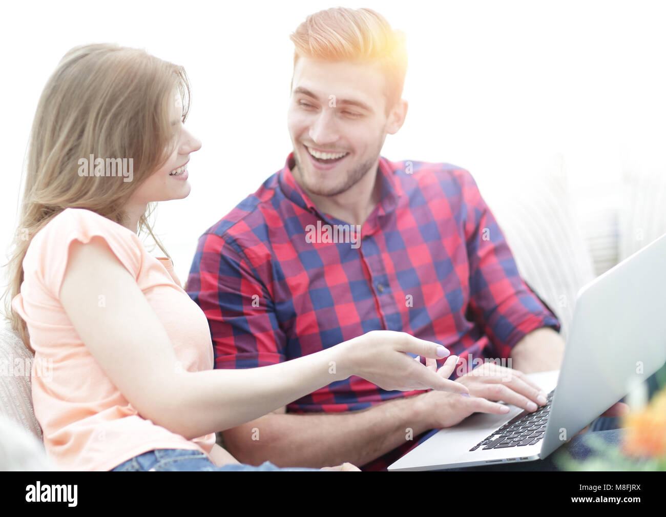 closeup of young couple with laptop Stock Photo - Alamy