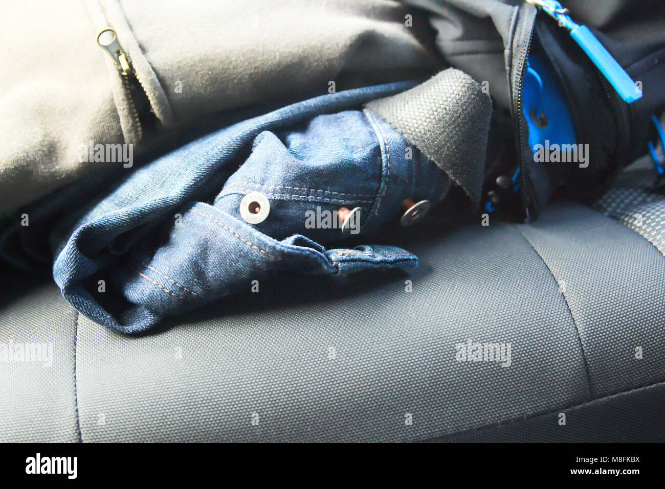 Jeans on Car Back Seat Stock Photo Alamy