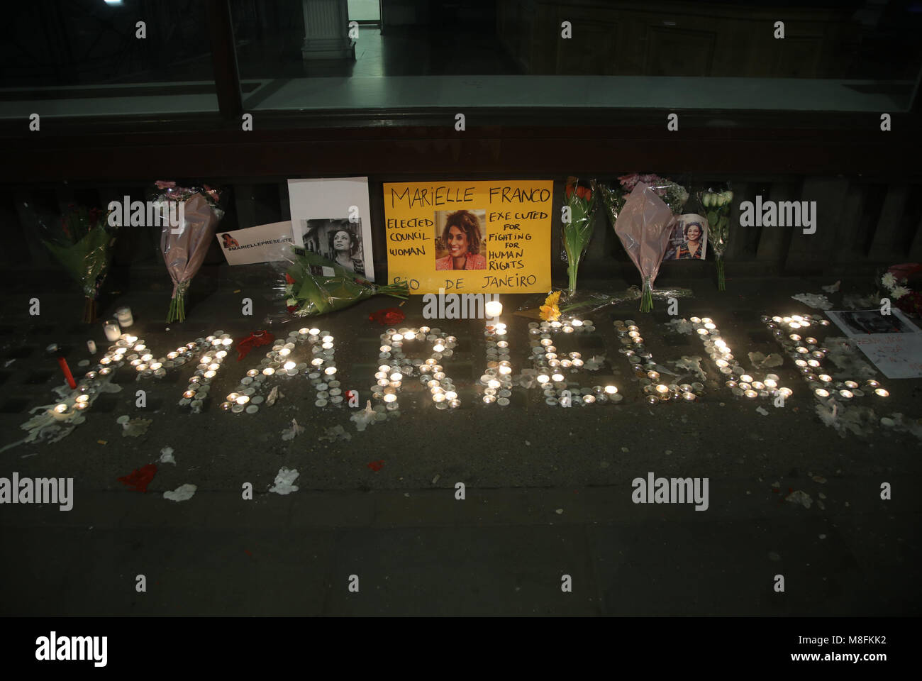 Tributes outside the Embassy of Brazil in London to Marielle Franco, 38, a Rio city councillor who was shot dead on Wednesday March 14 in downtown Rio de Janeiro, in an apparent targeted assassination. Stock Photo