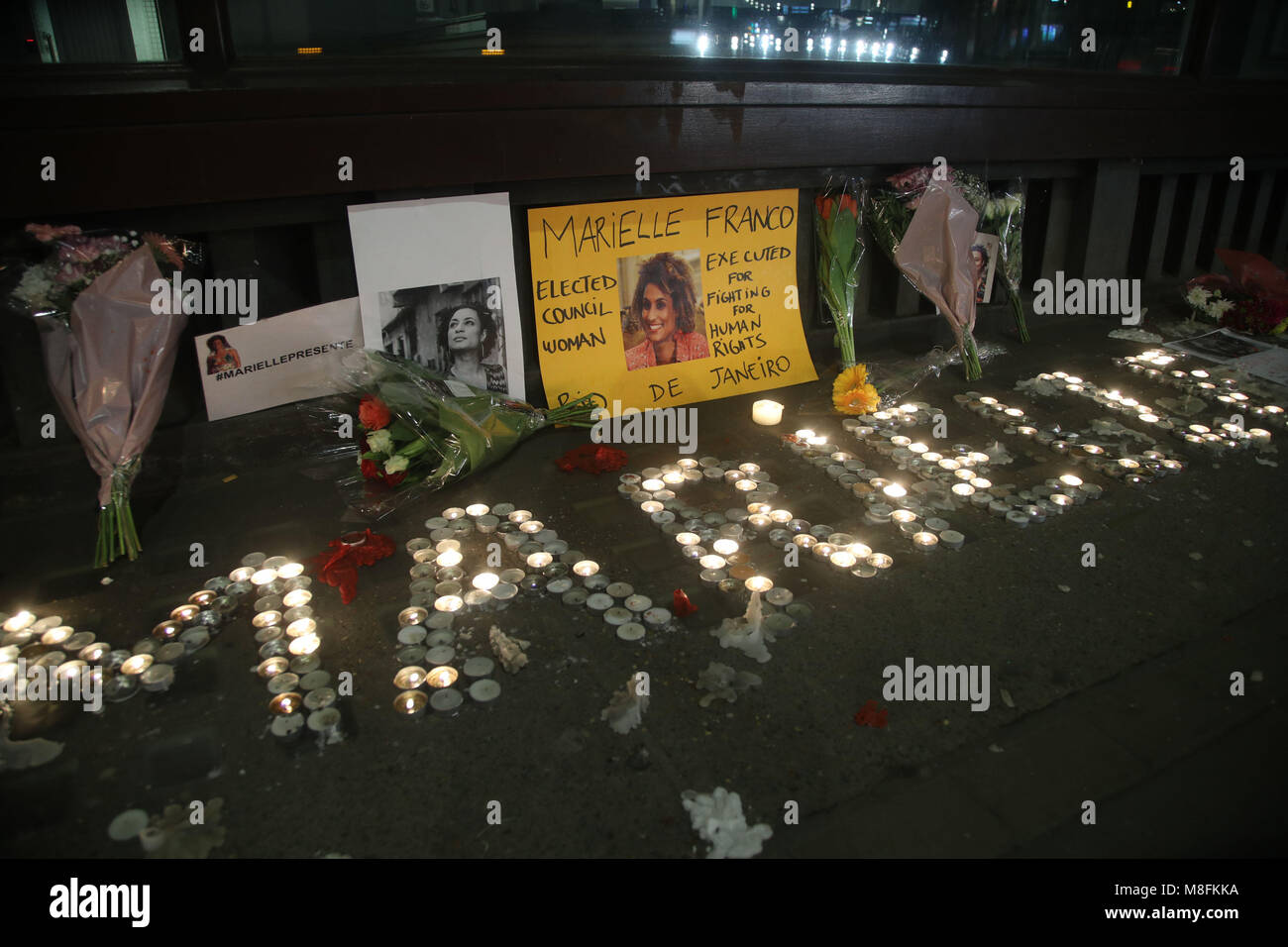 Tributes outside the Embassy of Brazil in London to Marielle Franco, 38, a Rio city councillor who was shot dead on Wednesday March 14 in downtown Rio de Janeiro, in an apparent targeted assassination. Stock Photo