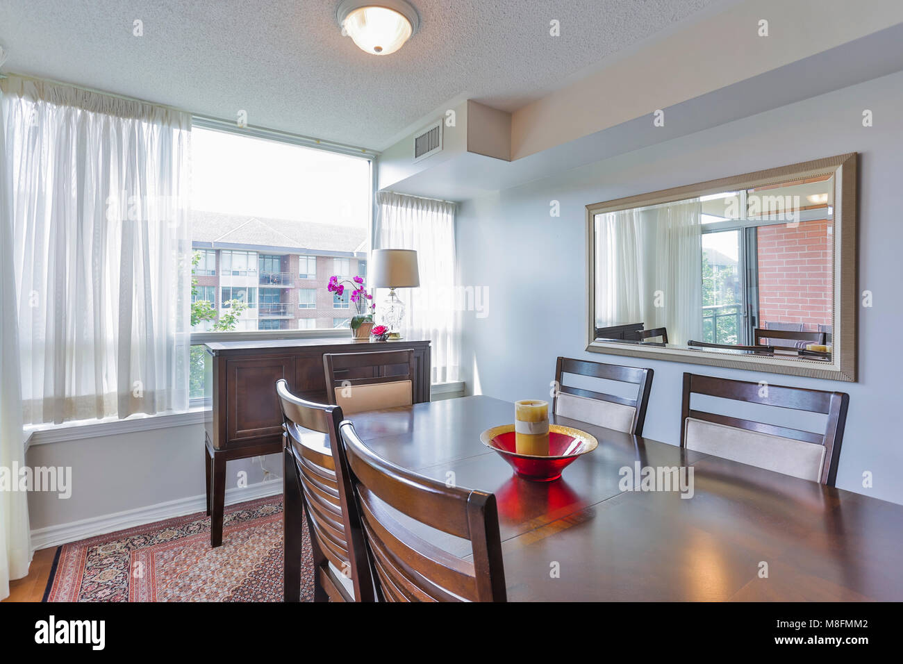 Interior of dining room in a new house Stock Photo