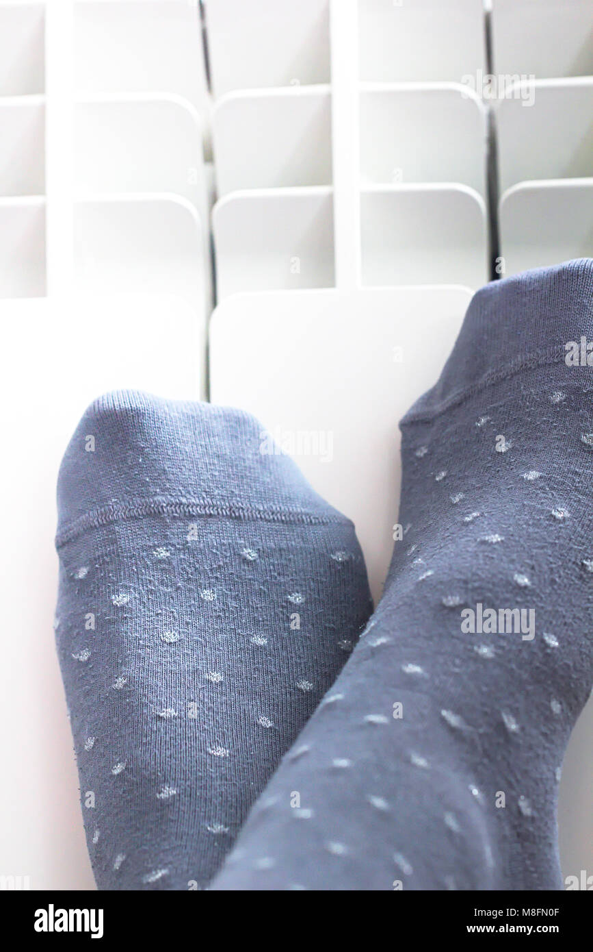 Heating Legs on Radiator Stock Photo Alamy