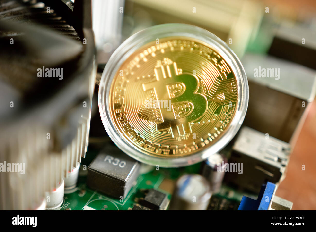 Close up of virtual currency bitcoin on computer motherboard Stock ...