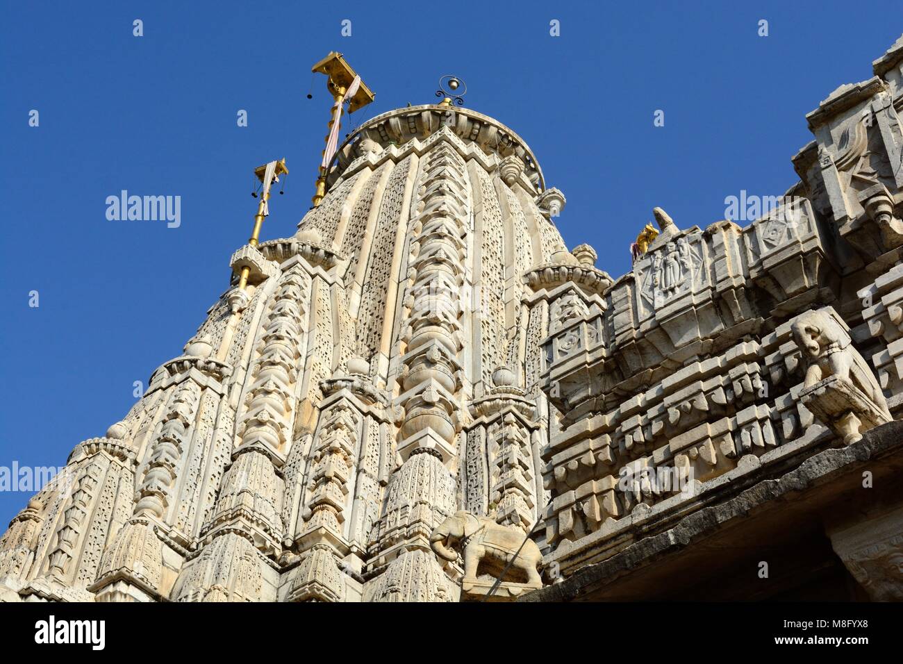 Jagdish Mandir exterior a large ornately carved Hindu Temple Devoted to Lord Vishnu set in the middle of the old town of Udaipur Rajashan India Stock Photo