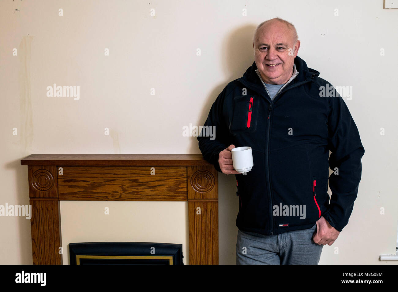1980 Iranian Embassy Siege SAS veteran Bob Curry enjoys his first cup of tea in his new home. Stock Photo
