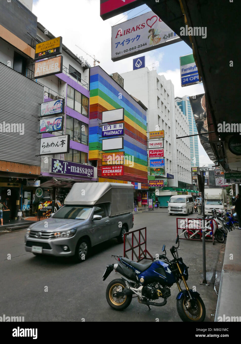Side Street with multicoloured buildings off Silom Road in Bangkok, Thailand Stock Photo