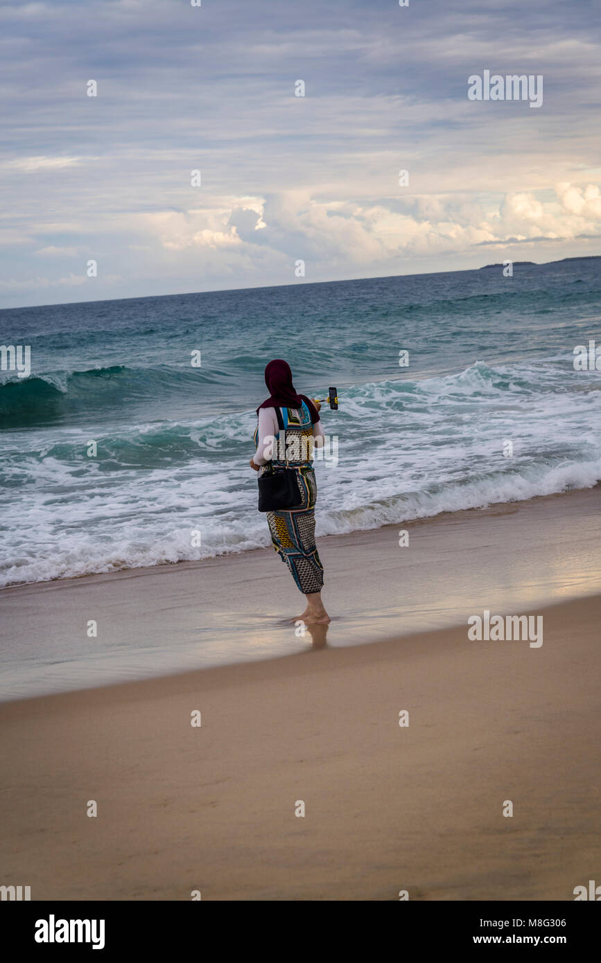 Woman with a scarf taking a selfie, Wollongong, NSW,  Australia. Stock Photo