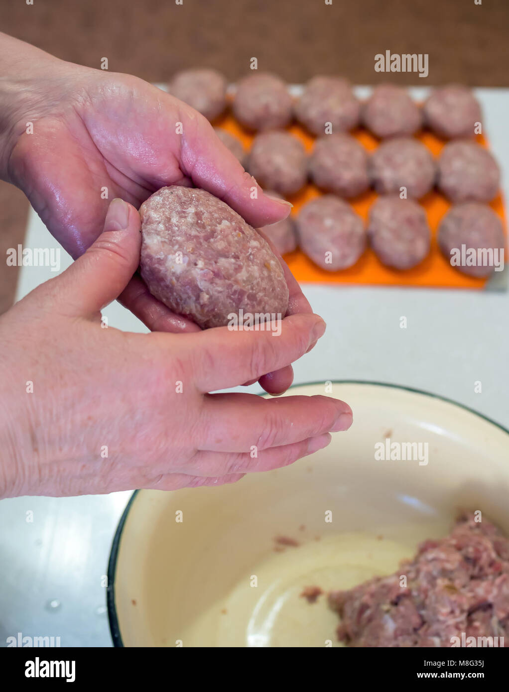 Cooking ground beef patties from home Stock Photo Alamy