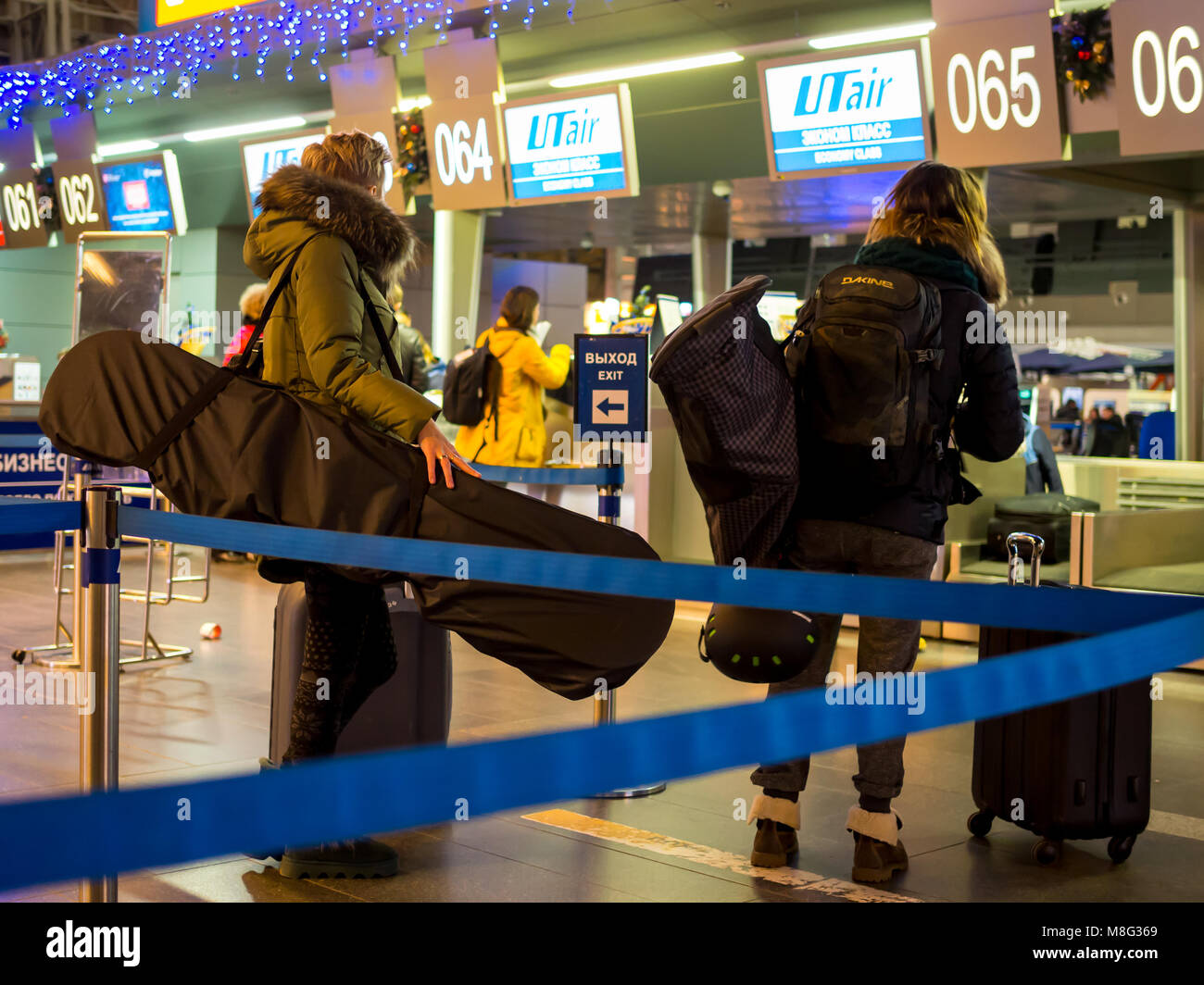 Moscow, Russia - December 29, 2015:  Passengers with inventory for the winter sports awaiting registration at the airport  Vnukovo Stock Photo