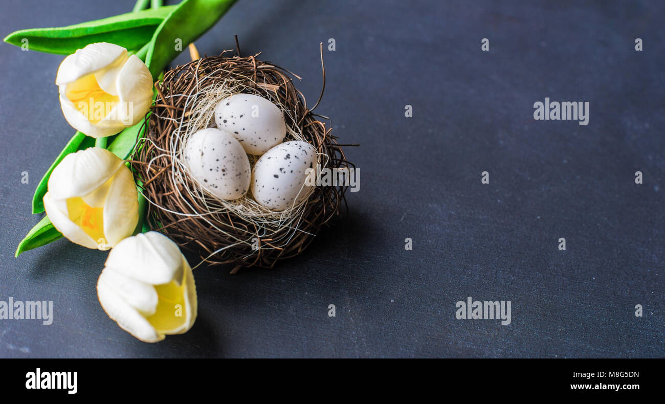 Easter frame with tulips and easter eggs on dark background Stock Photo ...