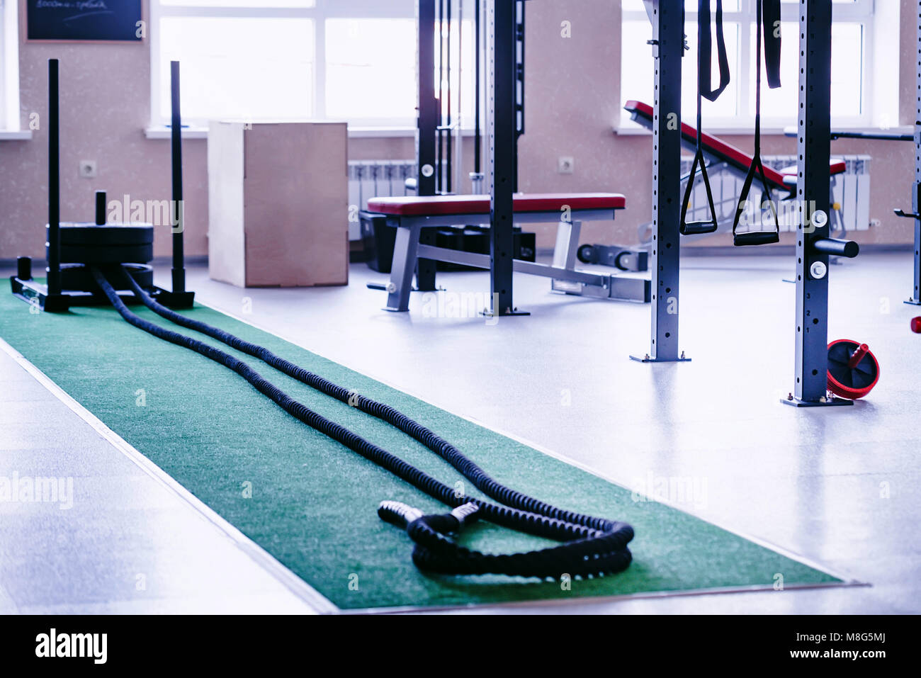 Fitness equipment in gym Stock Photo Alamy