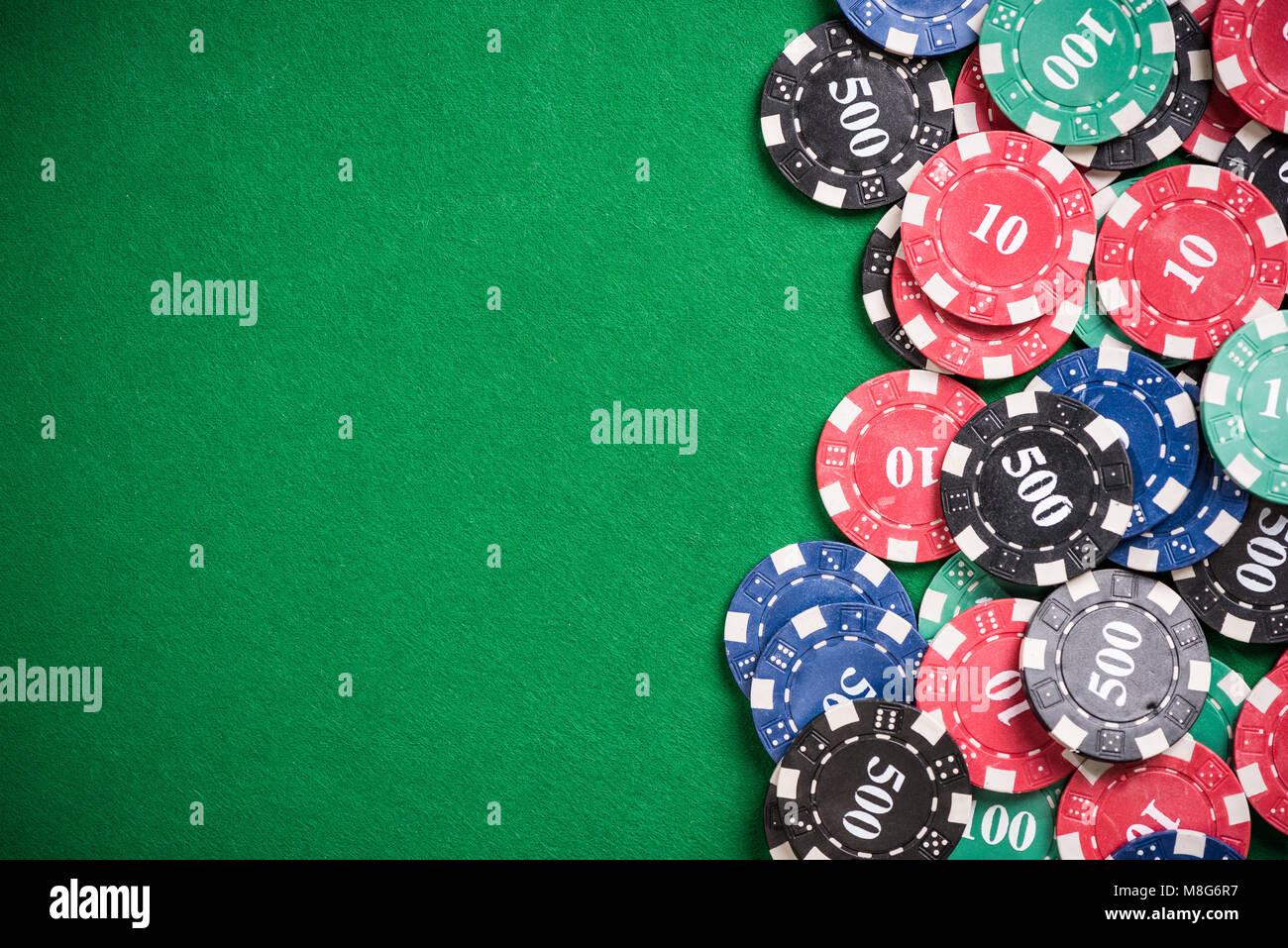 Casino games border background with copy space over green poker table
