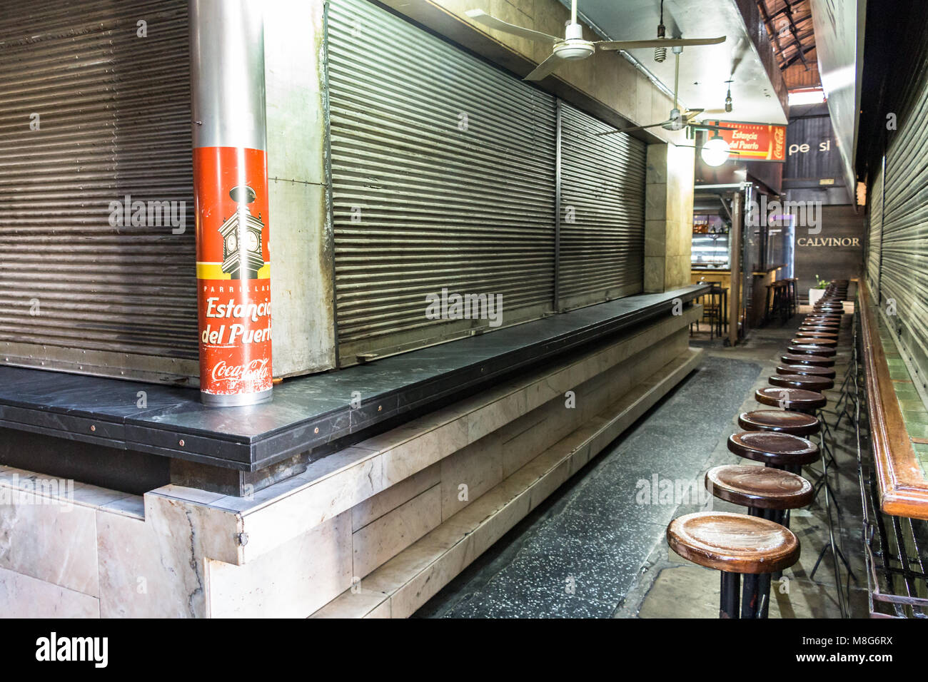 Montevideo, Uruguay - February 25th, 2018: Closed restaurant inside the Port Market (Mercado del puerto) Montevideo. Stock Photo
