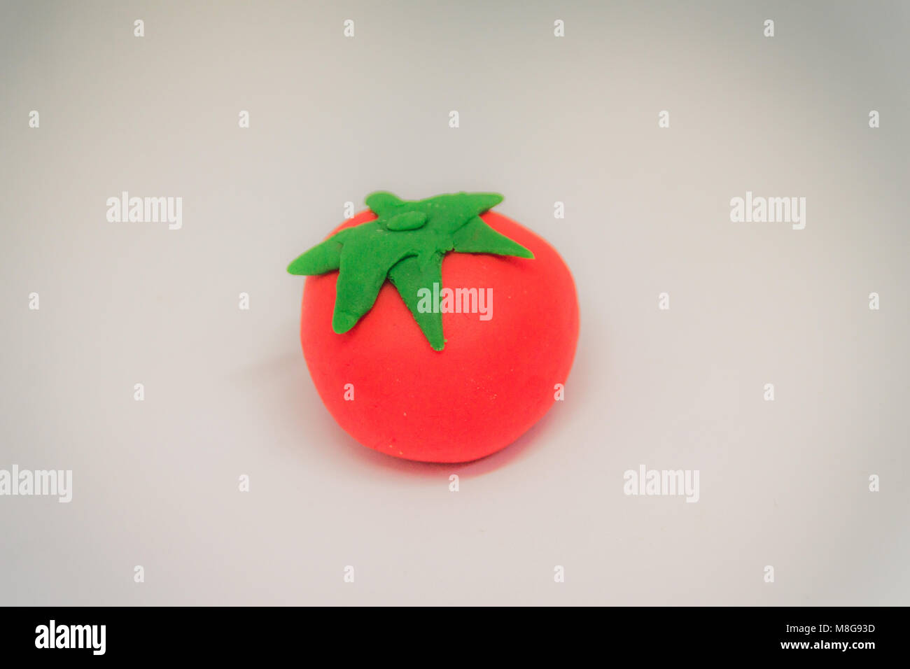 Photograph of a plasticine tomato Stock Photo