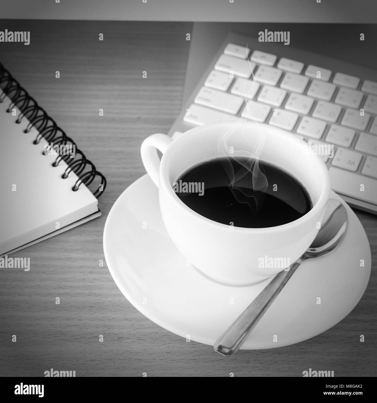Wooden table laptop coffee Black and White Stock Photos & Images - Alamy