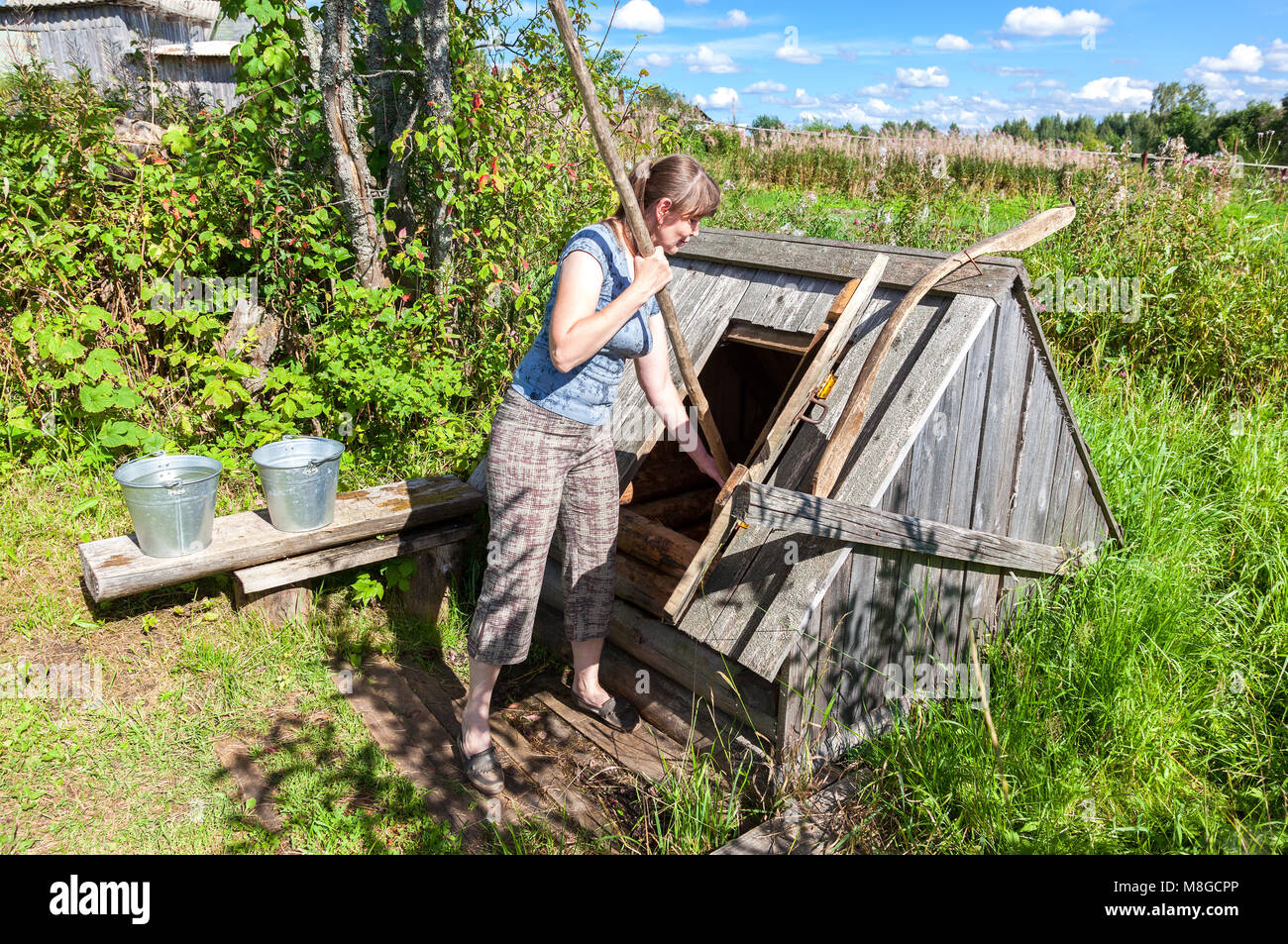 Water well bucket lever hi-res stock photography and images - Alamy