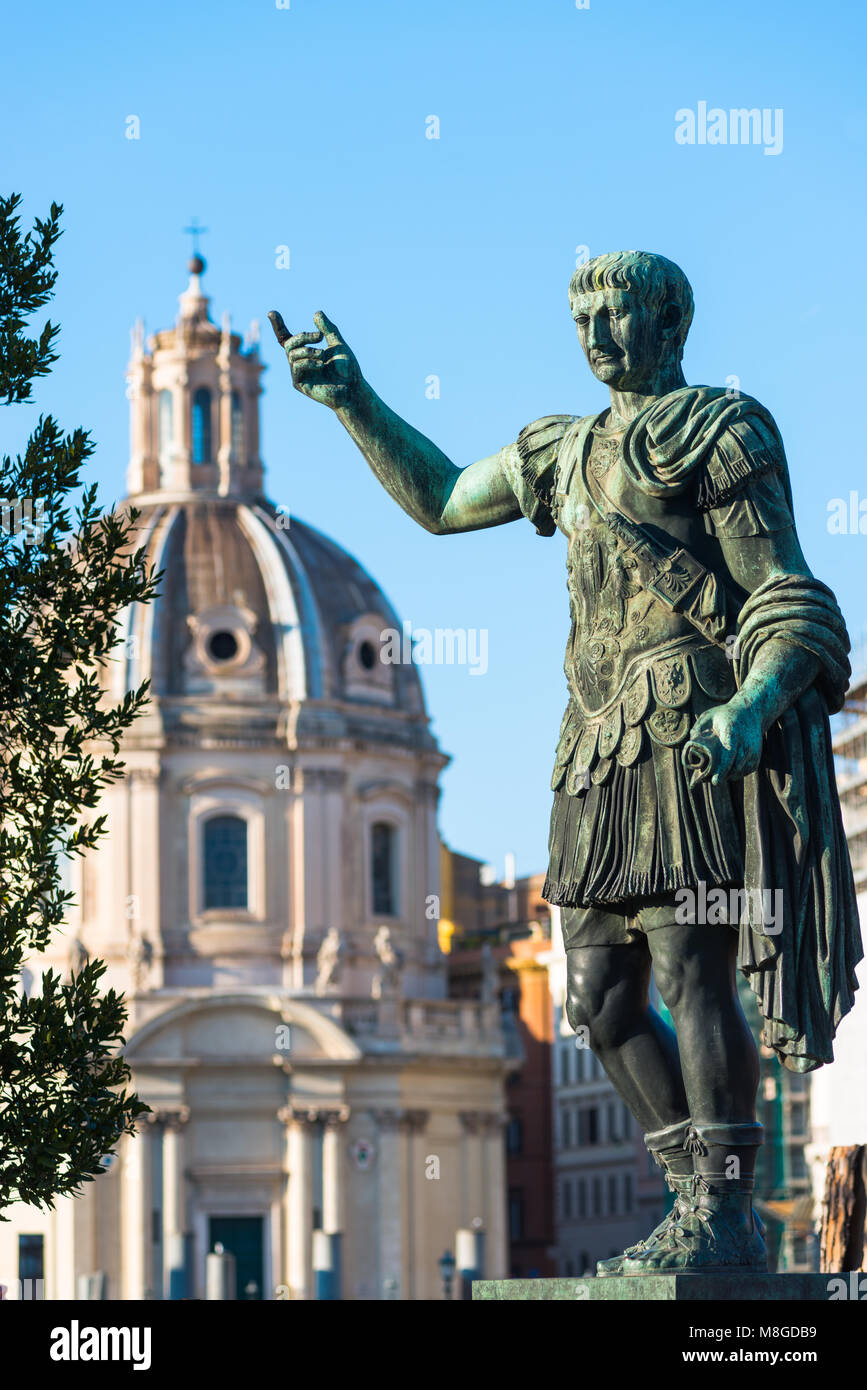 Emperor Trajan statue at Trajan's Market and Forum in the city of Rome, Italy, located on the Via dei Fori Imperiali, Rome, Lazio, Italy. Stock Photo