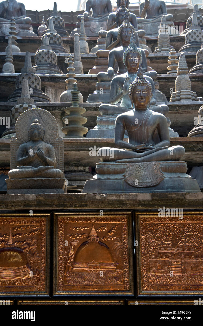 The Borobudur Replica Indonesian Buddha statues at the Gangaramaya (Vihara) Buddhist Temple complex in Colombo, Sri Lanka. Stock Photo