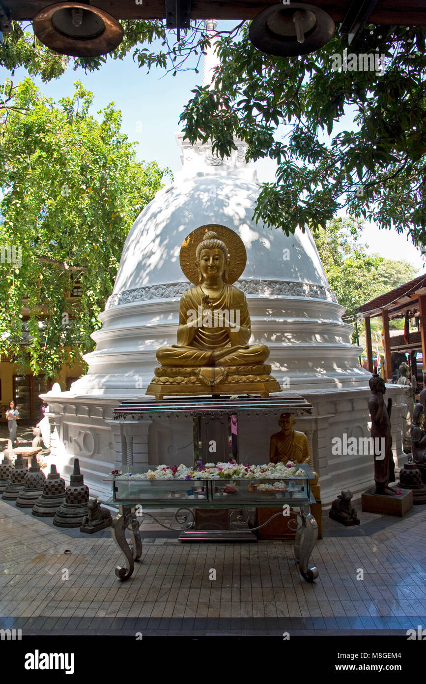 The Samadhi Statue and Stupa at the Gangaramaya (Vihara) Buddhist Temple complex in Colombo, Sri Lanka. Stock Photo