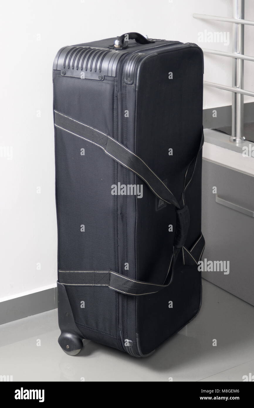 Big black travel bag with clipping path and wheels in an upright position  Stock Photo - Alamy